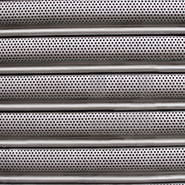 Perforated slats for riot proof roll up door