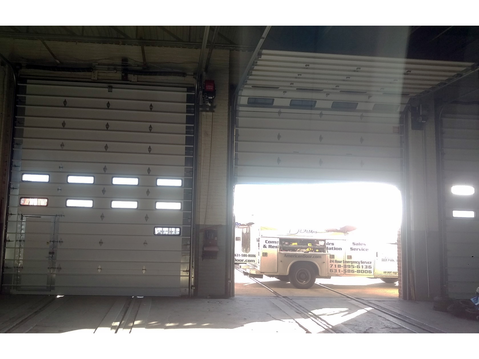 Sectional steel door with windows and wicket door - Baypark_marine