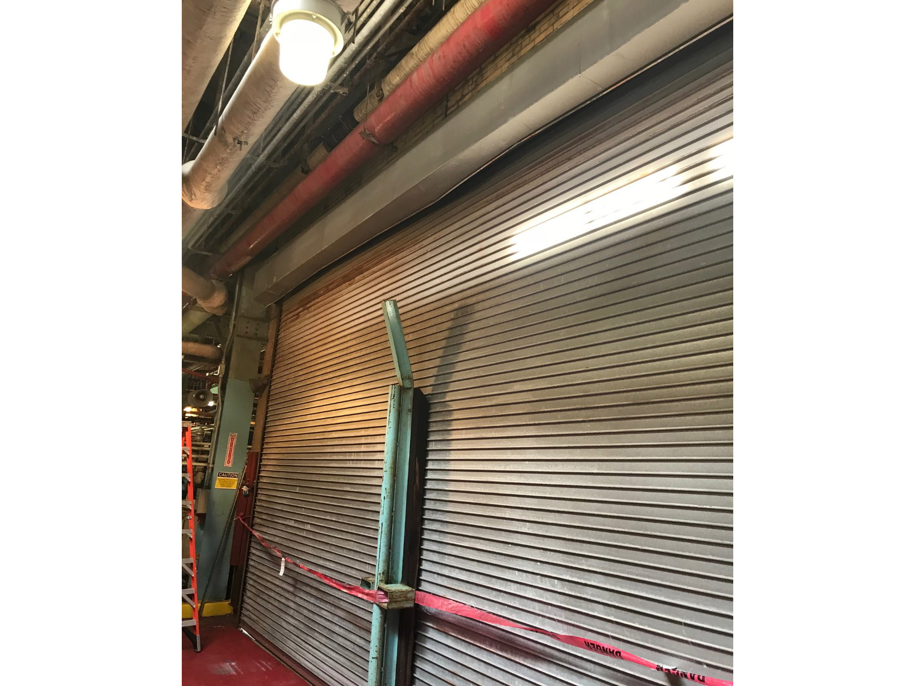 Damaged rolling door