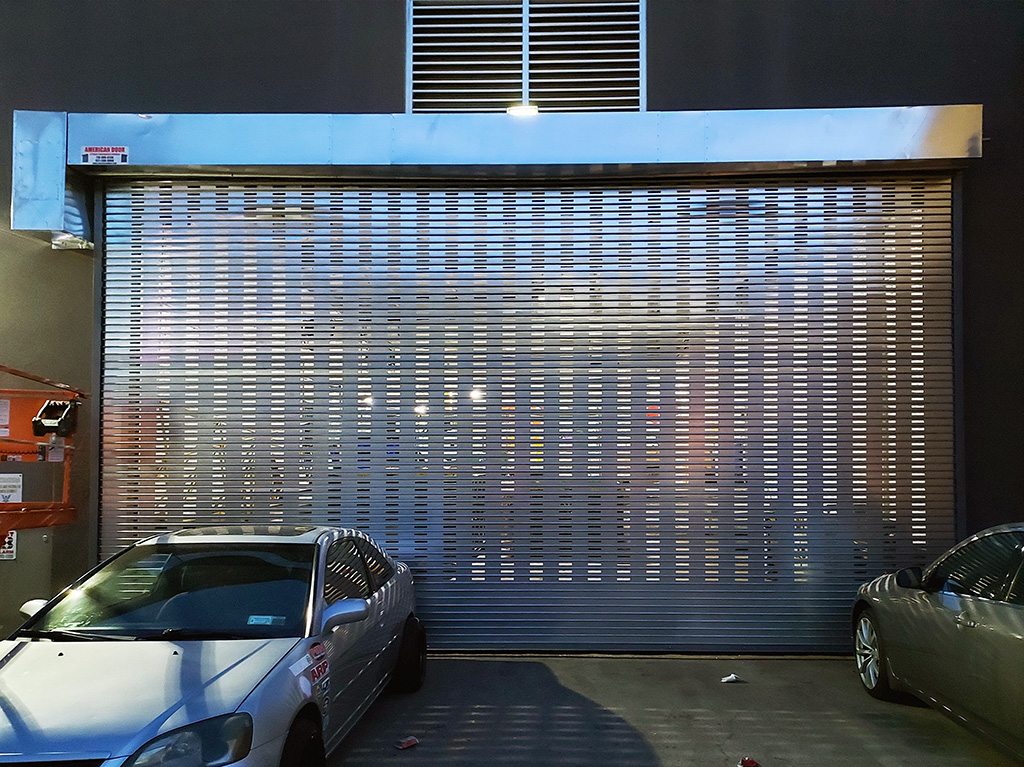 Perforated rolling door installation