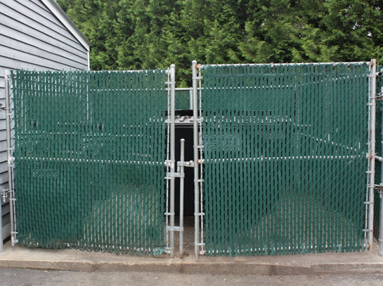 Dumpster enclosure fence gate